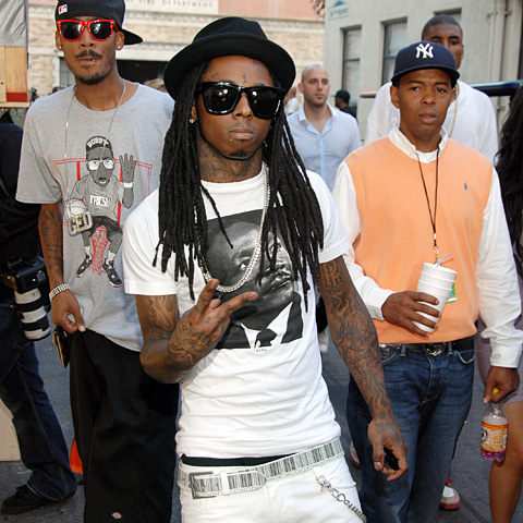 Is is that a LIP PIERCING, WAYNE AS 'WEEZYLICIOUS'